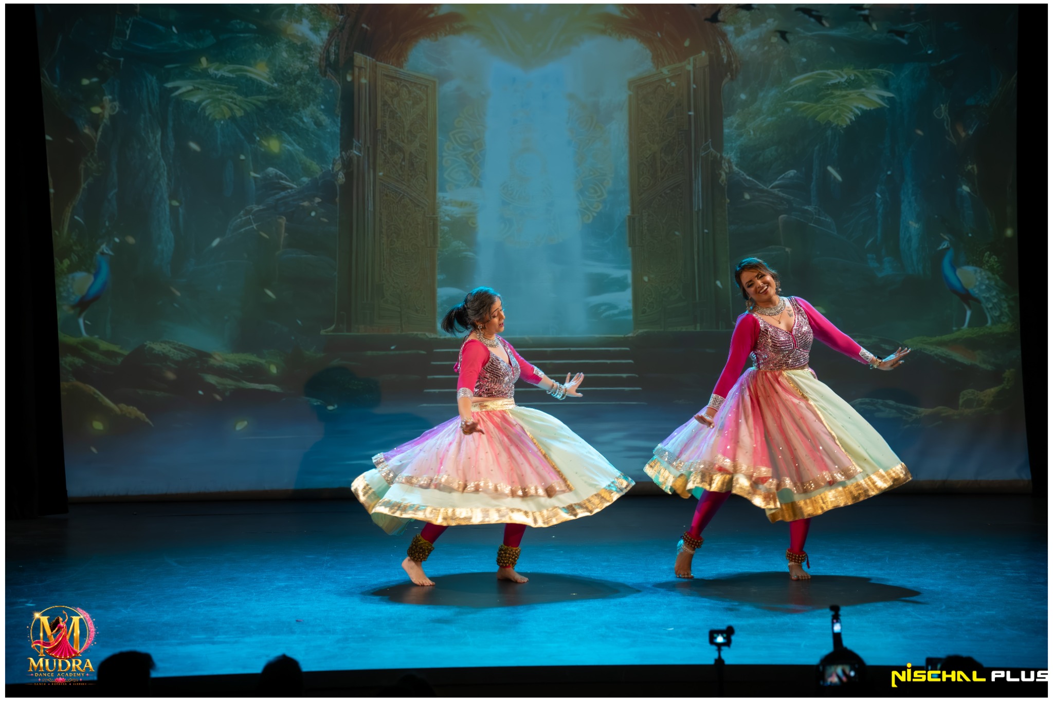 Two Mudra Dance Academy dancers performing a graceful duet at the Mid-Year Showcase