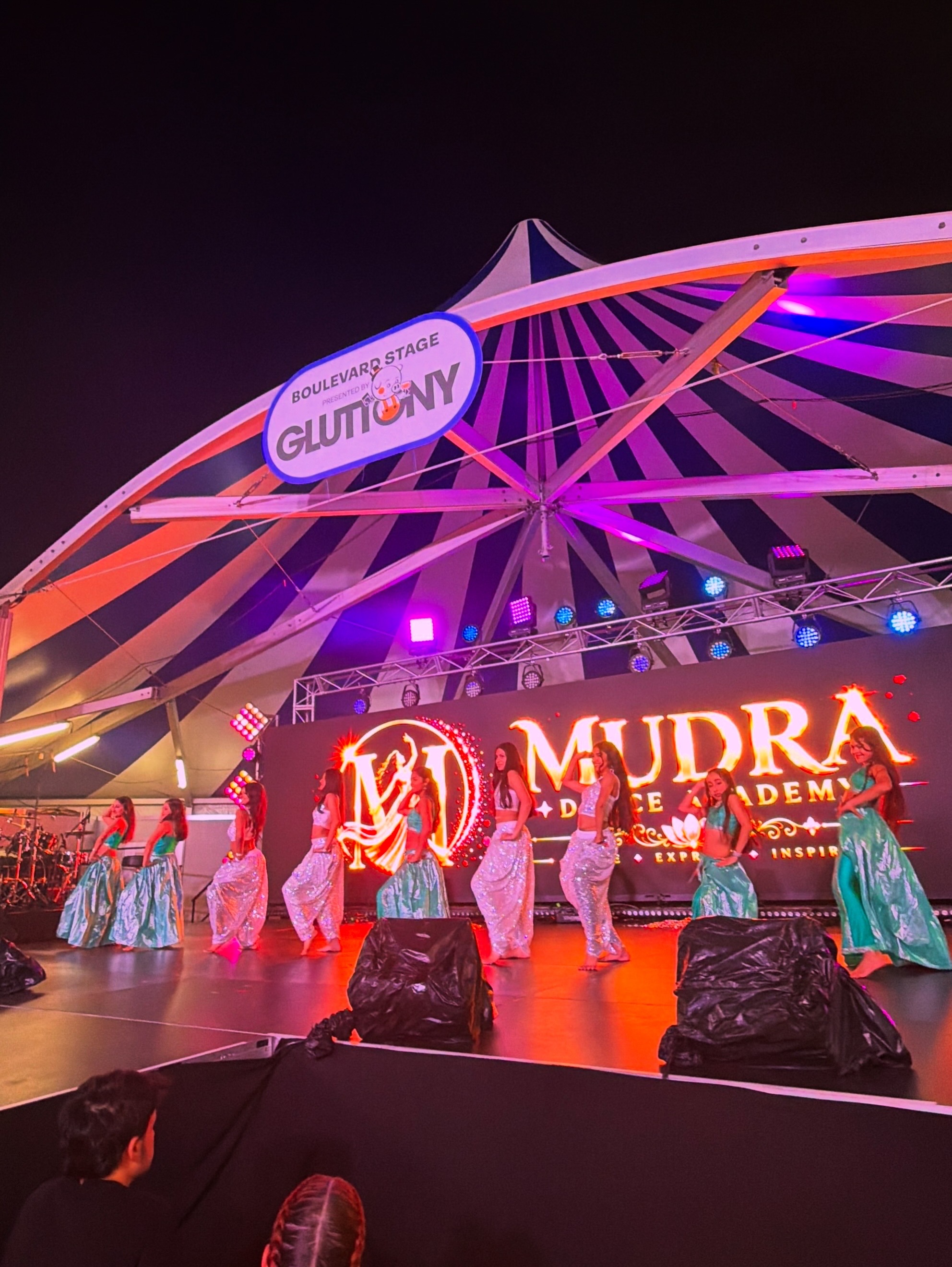 Mudra Dance Academy dancers in green and silver costumes performing at the Royal Adelaide Show